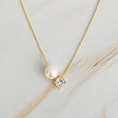 Single Pearl and Diamond Necklace.