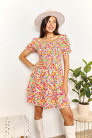 Devine Smocked Sweetheart Neck Flounce Sleeve Mini Dress.