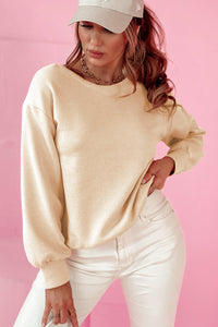 Bow Cutout Round Neck Long Sleeve Sweatshirt.