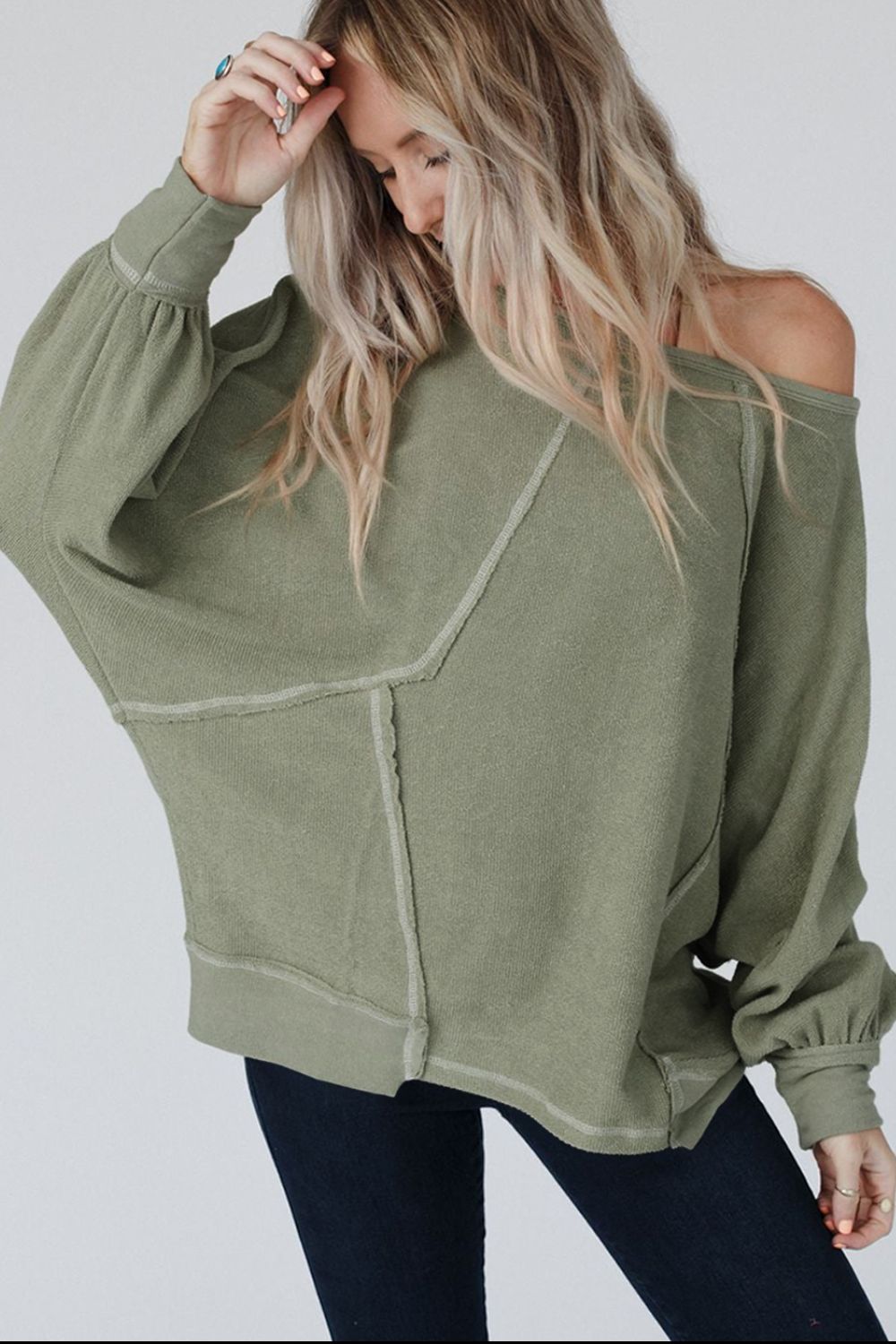 Exposed Seam Single Shoulder Long Sleeve Top.