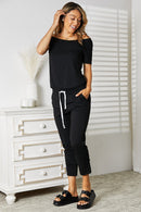 Double Take Asymmetrical Neck Tied Jumpsuit with Pockets.