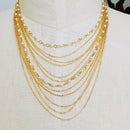 Beautifully Draping Pearl and Chain Necklace.