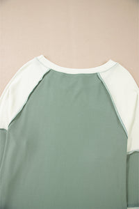 Color Block Round Neck Raglan Sleeve Top.