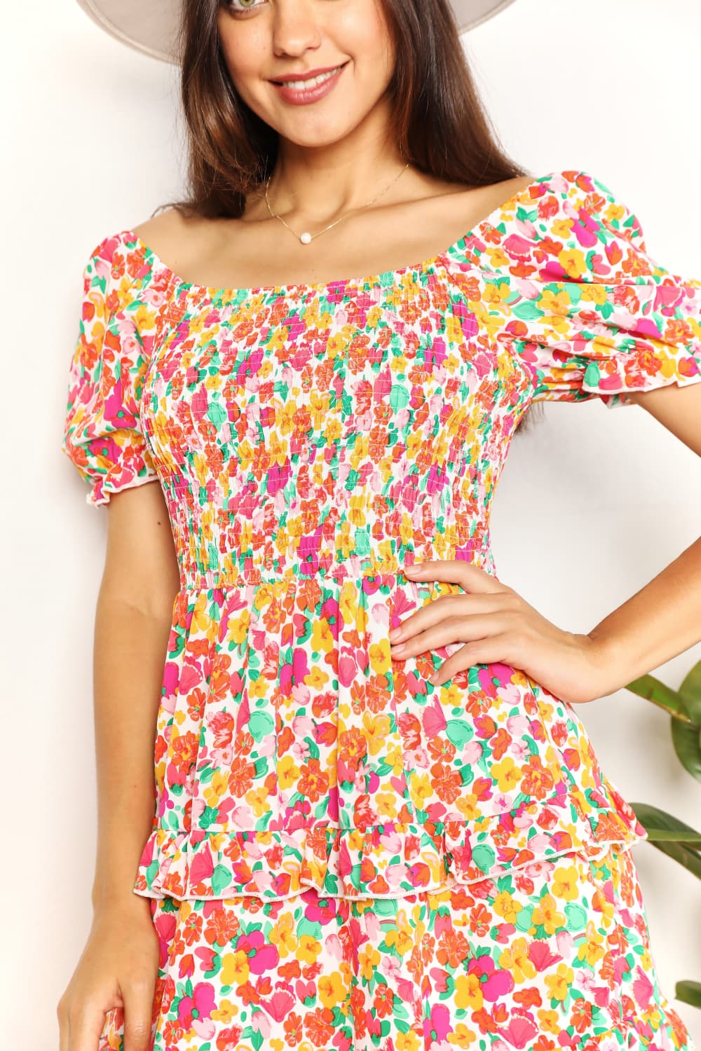 Devine Smocked Sweetheart Neck Flounce Sleeve Mini Dress.