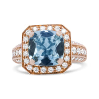 18K Rose Gold 10x10mm Cushion Shaped Aquamarine and 1 1/8 Cttw Round Diamond Halo Ring (F-G Color, VS1-VS2 Clarity).