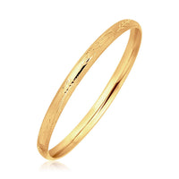 14k Yellow Gold Dome Style Childrens Bangle with Diamond Cuts (5.50 mm) | 5.5'' - Forever in Harmony