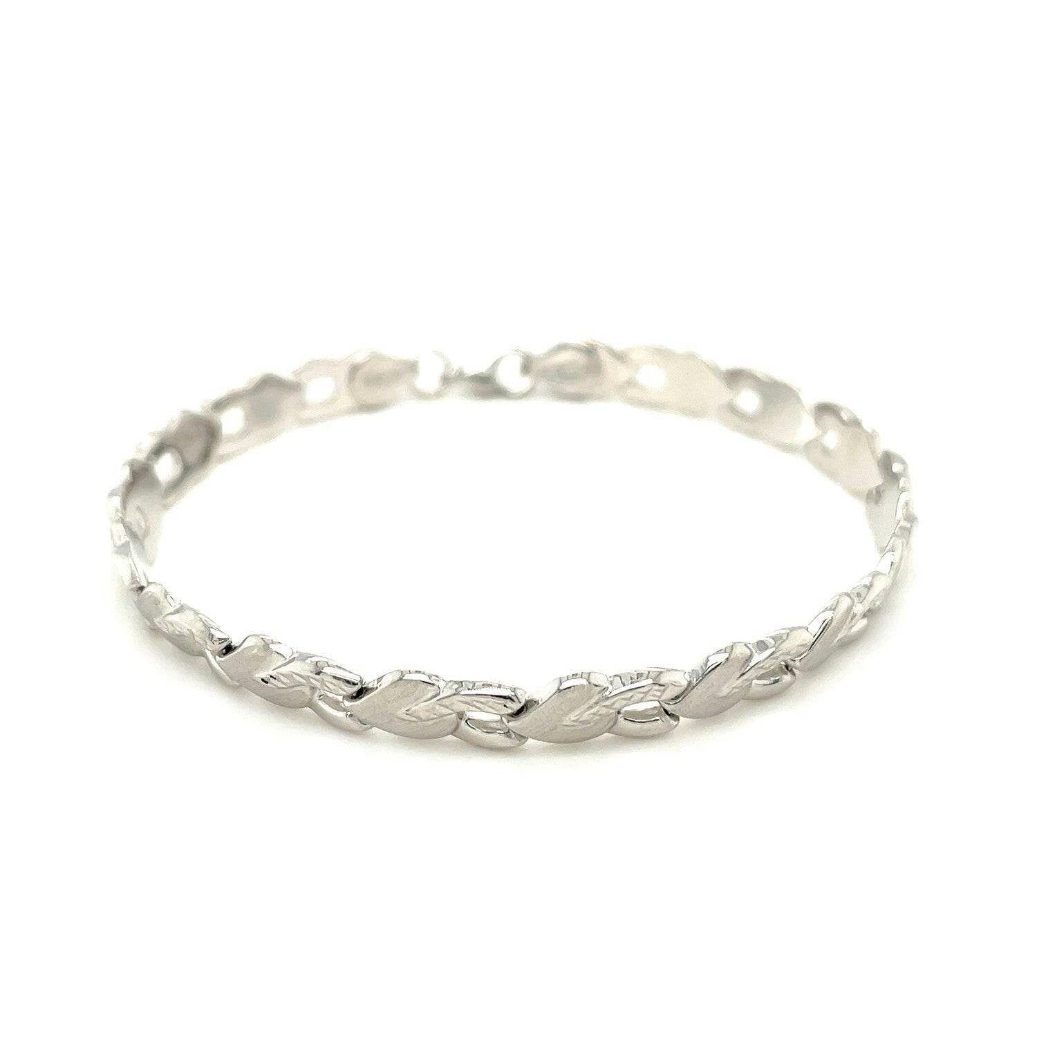 14k White Gold Heart Shape Textured Bracelet (6.35 mm) |