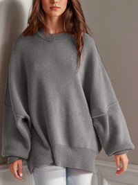 Double Take Side Slit Round Neck Long Sleeve Sweater.