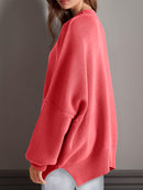 Double Take Side Slit Round Neck Long Sleeve Sweater.