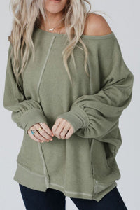 Exposed Seam Single Shoulder Long Sleeve Top.