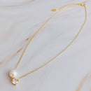 Single Pearl and Diamond Necklace.