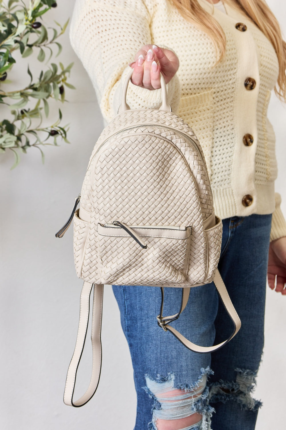 SHOMICO PU Leather Woven Backpack.