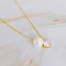 Single Pearl and Diamond Necklace.