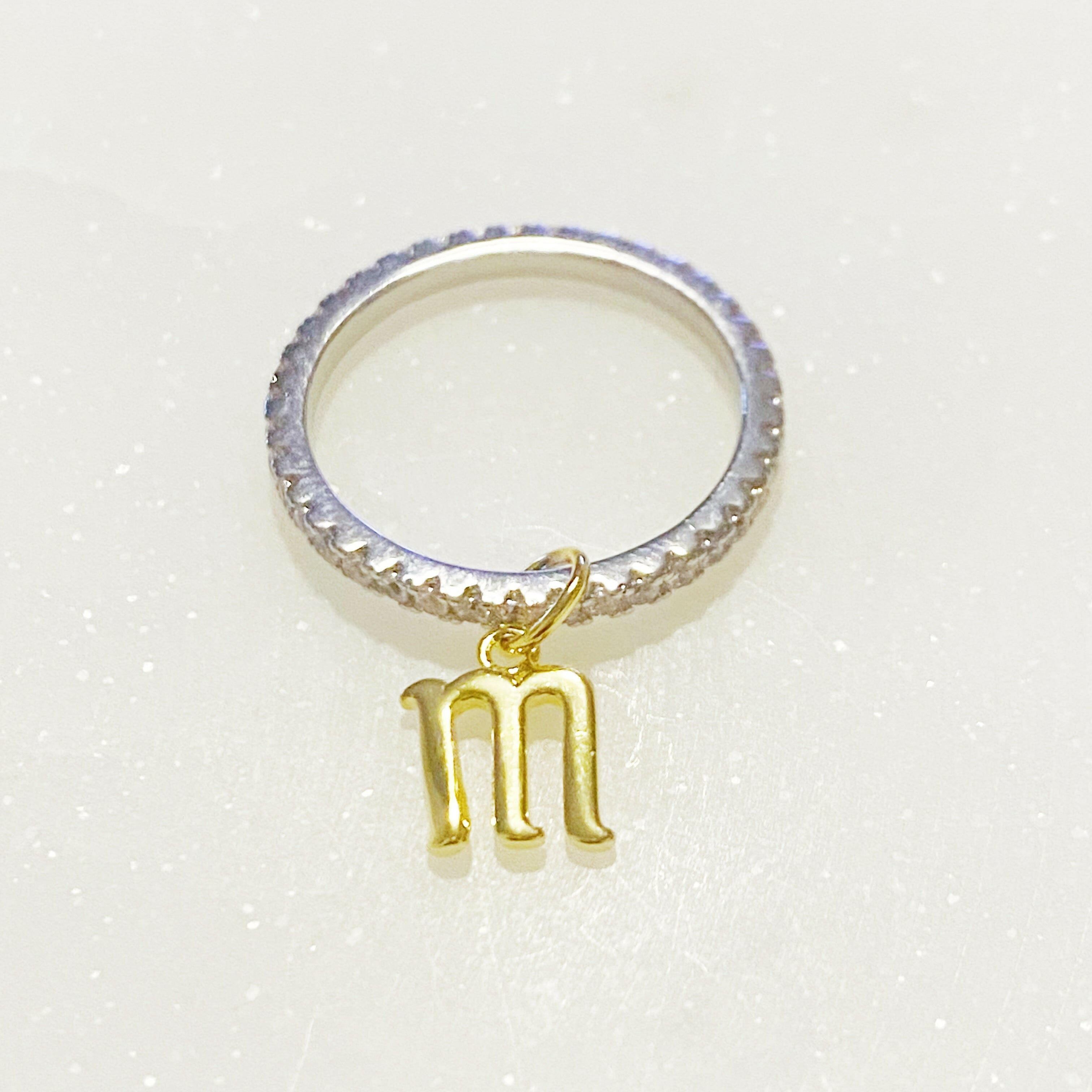 Dangle Initial Ring.