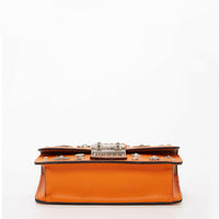 The Hollywood Studded Leather Crossbody Bag Orange.